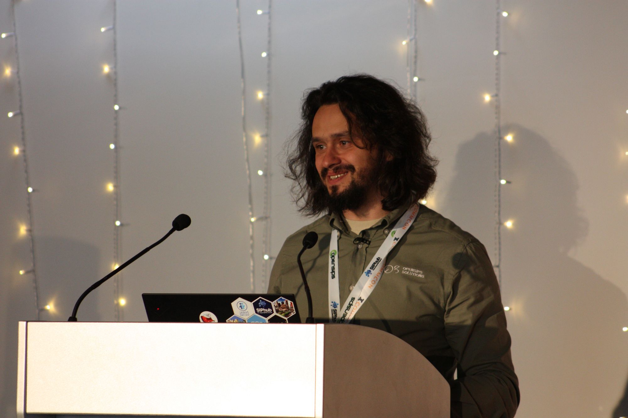 Razvan Crainea speaking at CommCon London 2024